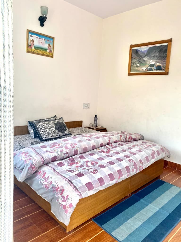 Cozy Double Bed & Wood Flooring
